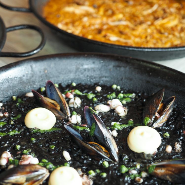 Group Of Paellas Squid Ink Paella, Traditional Paella, Mushroom And Chicken Paella from Tapas Club (VivoCity) at VivoCity in Harbourfront, Singapore